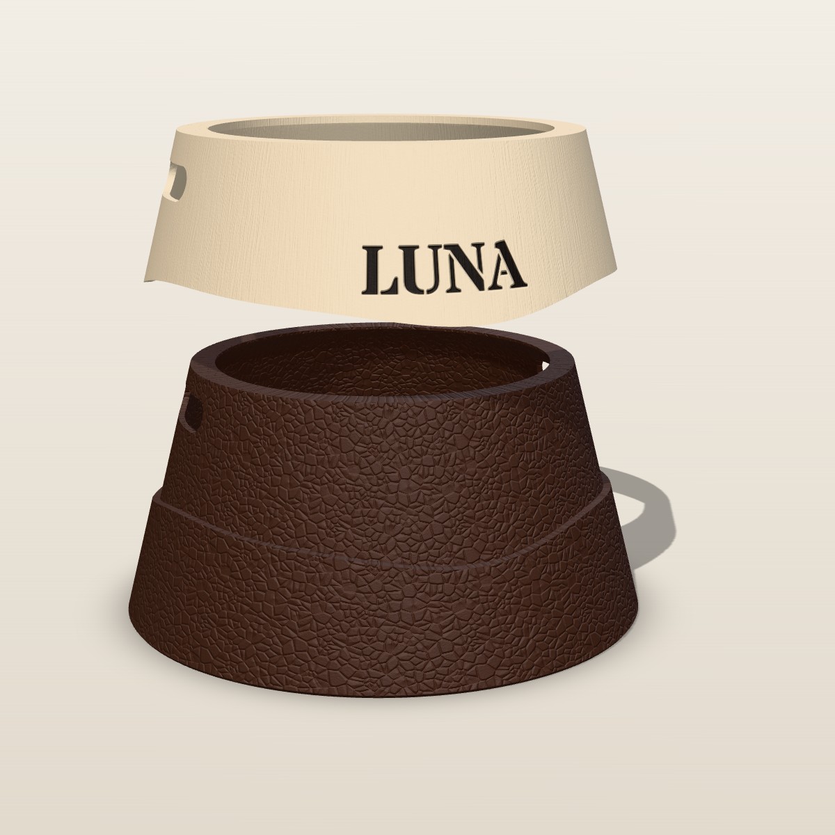 As duas peças do suporte Onda Contraste separadas, capa areia com o nome Luna e base chocolate